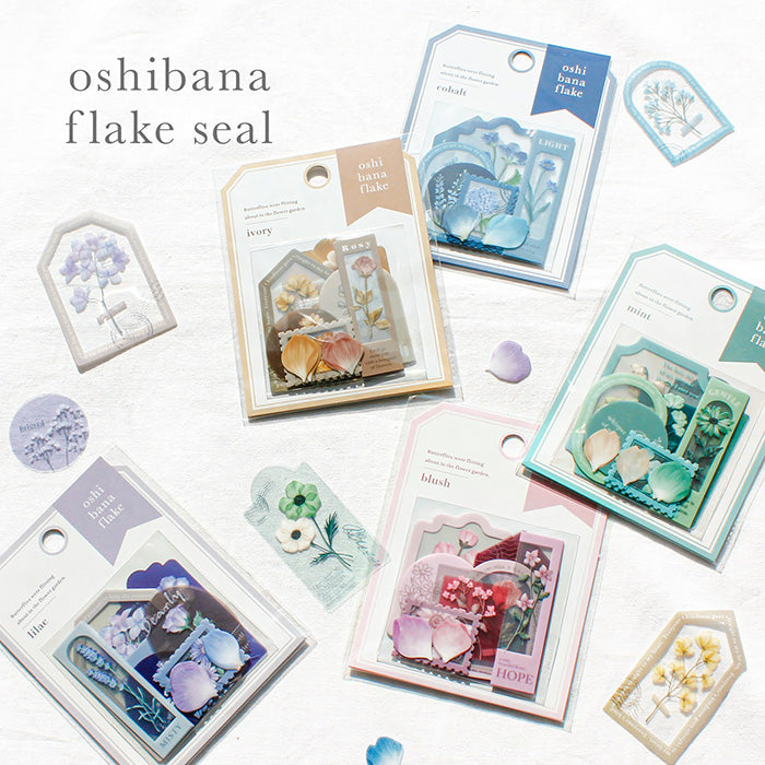 Mind Wave Oshi Bana Flower Sticker Flakes Ivory Add a touch of elegance to your papercraft projects with these color-coordinated Oshi Bana Flower PET -Sticker Flakes. This set includes exquisite flower and frame stickers that will elevate your planners, journals, or any other papercraft projects.