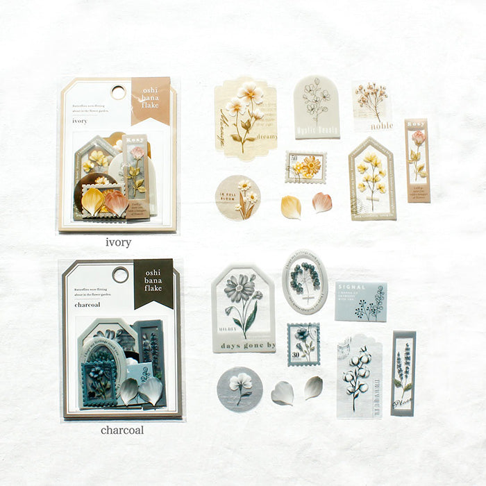 Mind Wave Oshi Bana Flower Sticker Flakes Charcoal Add a touch of elegance to your papercraft projects with these color-coordinated Oshi Bana Flower PET -Sticker Flakes. This set includes exquisite flower and frame stickers that will elevate your planners, journals, or any other papercraft projects.