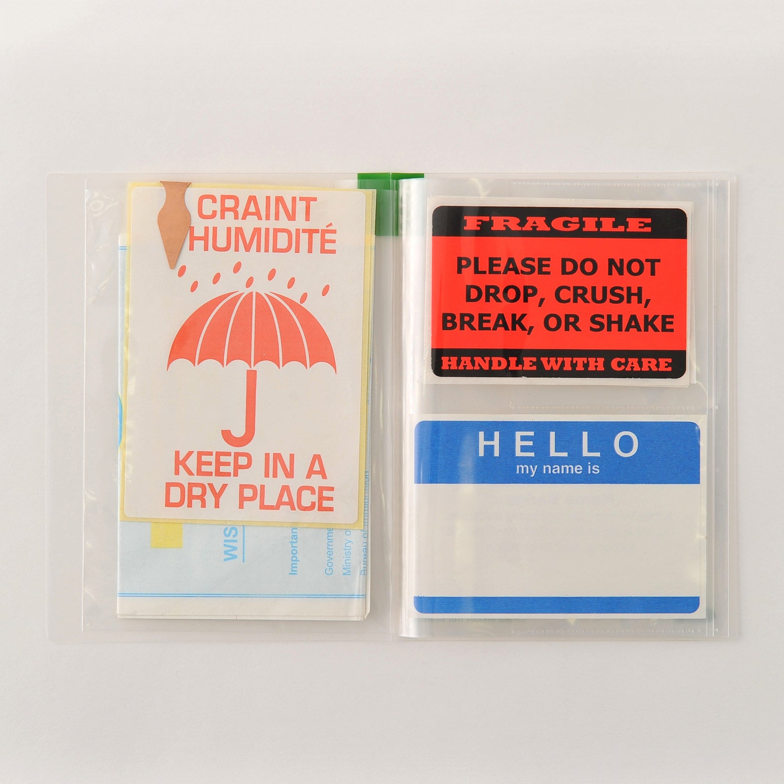 Hobonichi Card Case This card case holds up to 32 cards, such as point cards, business cards, or any small clippings or stamps. The flap allows it to fit perfectly into the Hobonichi Techo cover. The first and final pages are larger-size pockets to store items slightly larger than standard card size.