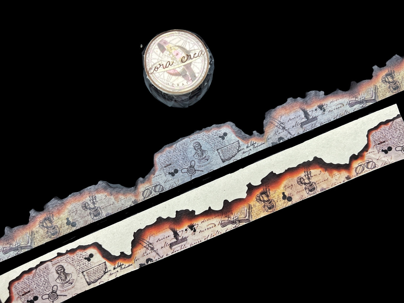 CoraCreaCrafts Burnt Edges Washitape A unique vintage style washi tape designed by CoraCreaCrafts. It features a manuscript style paper with die cut burnt edges.