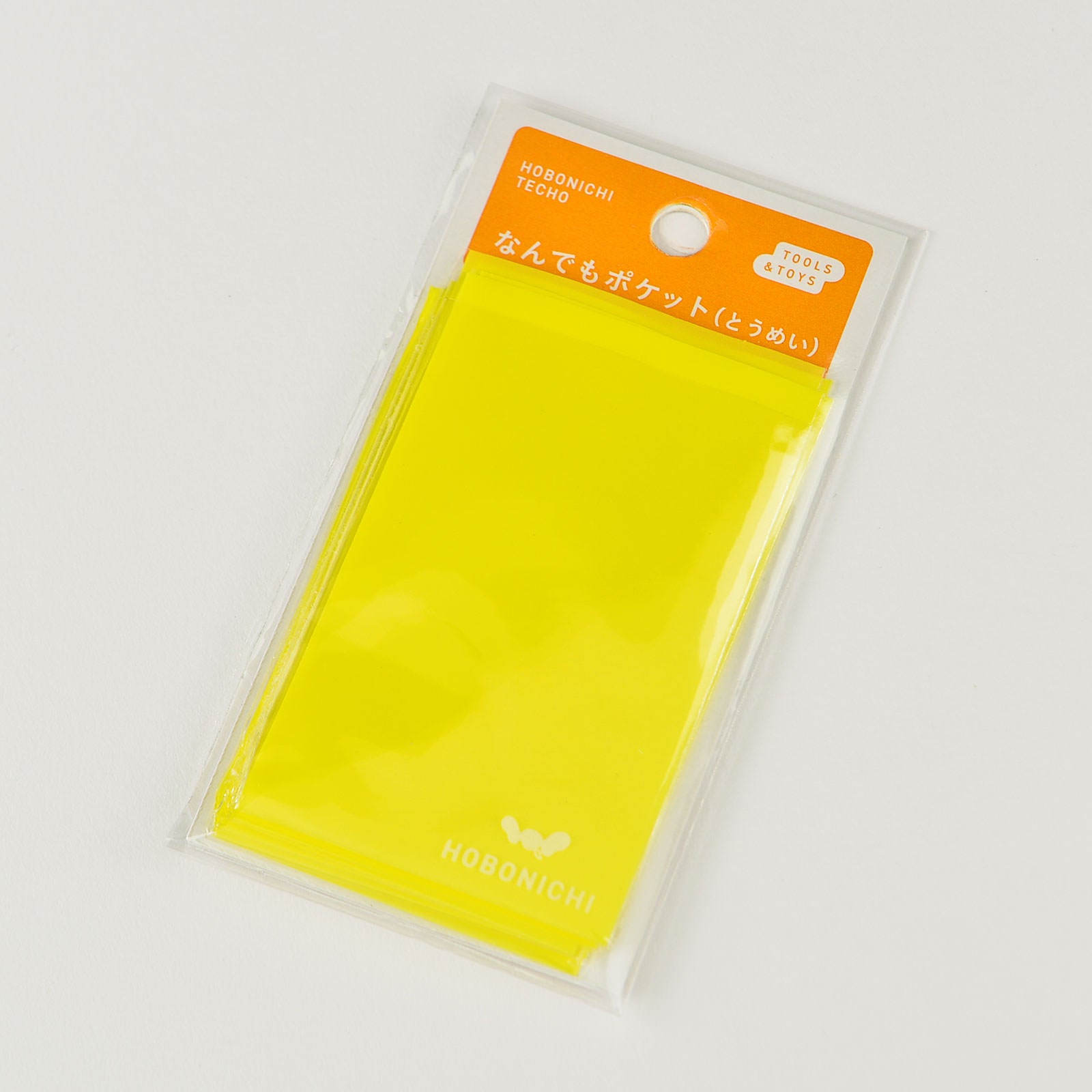 Hobonichi Anything Pocket Clear This adhesive clear envelope can be attached to a page in your techo and provide a storage pocket. Pocket is made of thin plastic, so it does not make your Hobonichi bulky. The Anything Pocket is useful for keeping things in your techo that you would prefer not to tape directly to the page. It can be used to store tickets, papers, stickers etc.