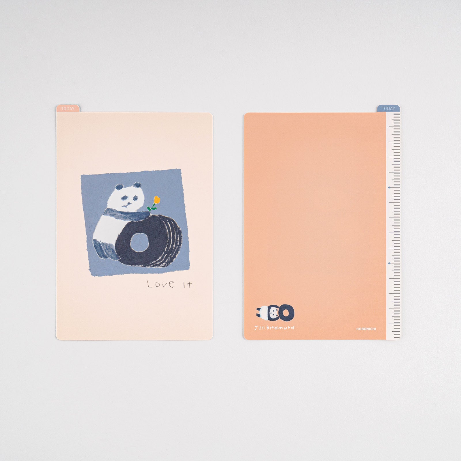 Hobonichi Jin Kitamura: Hobonichi Pencil Board for A6 Size (Love it (Panda)) This pencil board features pandas drawn by illustrator and children’s book author Jin Kitamura. The Hobonichi pencil boards are designed to use underneath the page you are writing on to keep your writing experience even smoother.