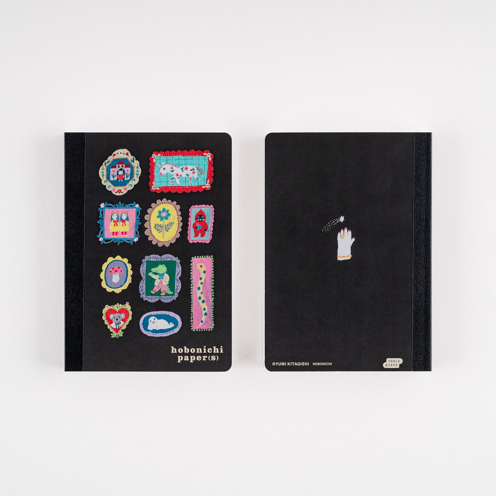 Hobonichi Yumi Kitagishi: Hobonichi Paper(s) Notebook (Take a Look) This A6 notepad has 155 pages. The paper inside is blank except for a lightly printed illustration, and the pages are glued in instead of sewn, making them very easy to rip out for shopping lists or passing along messages. The cover artwork is by illustrator Yumi Kitagishi titled Take a Look.