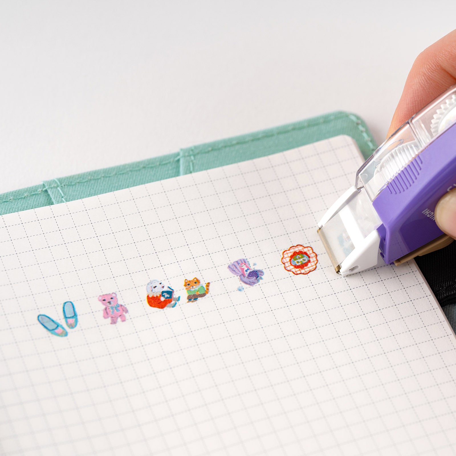 Hobonichi x Plus : Familiar Sights by Kanako Kagaya This Deco Rush is an original for the Hobonichi Techo and matches that matches the Cover on Cover and Clear Cover by Kanako Kagaya Deco Rush is a decorative tape that works like a correction tape and provides an easy way to spruce up your techo pages with a cute look.