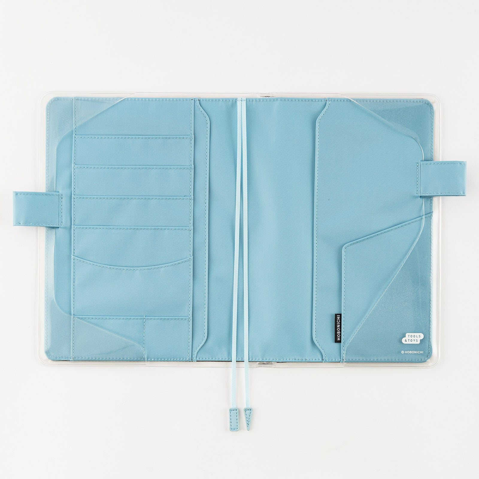 Hobonichi Clear Cover on Cover / A5 Cousin Cover on cover is a protective cover that can be used on top of your Hobonichi Cousin cloth covers to protect them from wear and tear. This product can not be used on top of the book only. You can also store illustrations under your cover on cover to boost your Hobonichi covers design.