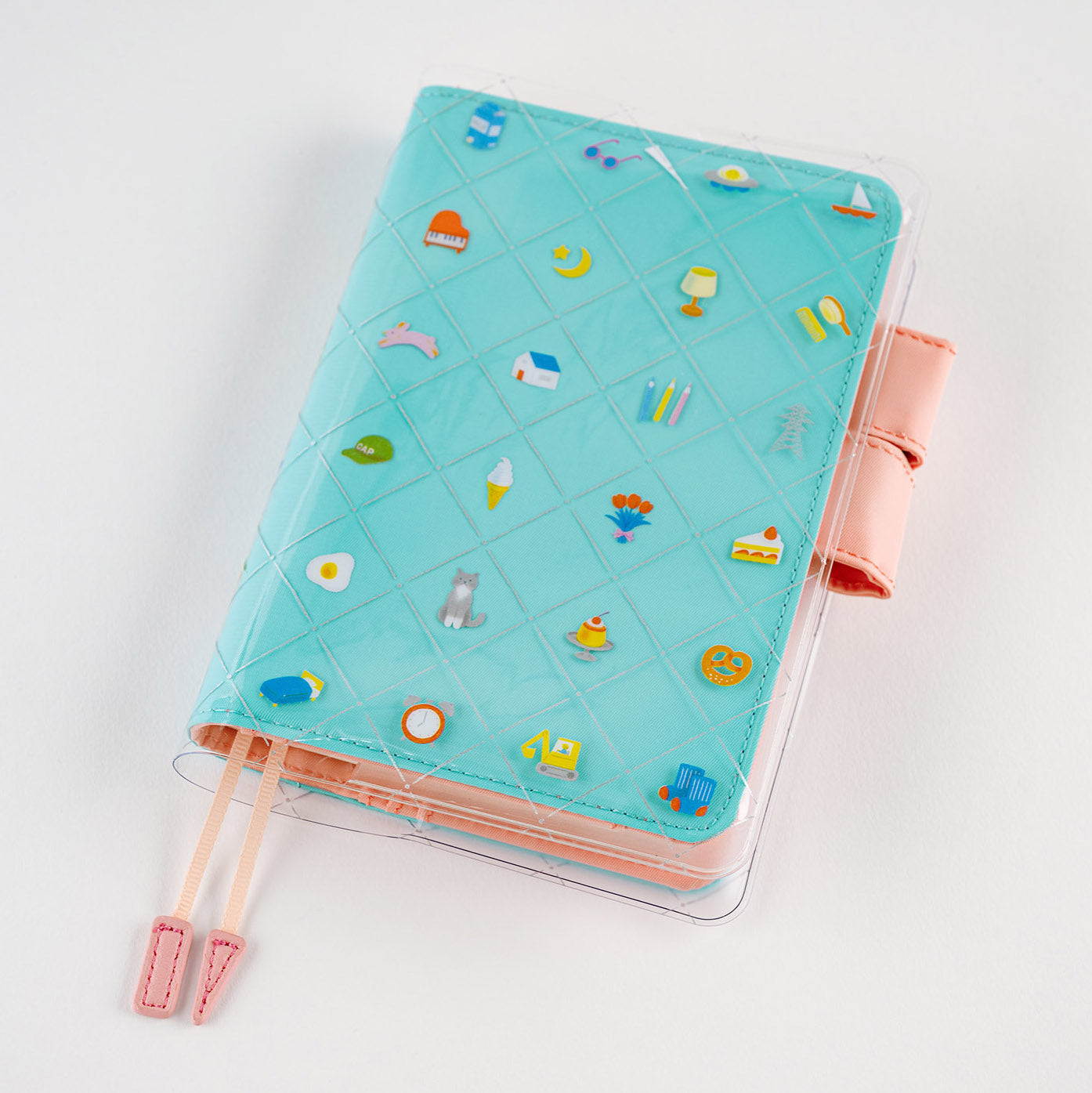 Hobonichi Kanako Kagaya: Cover on Cover for A6 Size (Familiar Sights)  Cover on cover is a protective cover that can be used on top of your Hobonichi cloth covers to protect them from wear and tear. This product can not be used on top of the book only. You can also store illustrations under your cover on cover to boost your Hobonichi covers design.   The design for “Familiar Sights” was created by designer and illustrator Kanako Kagaya.