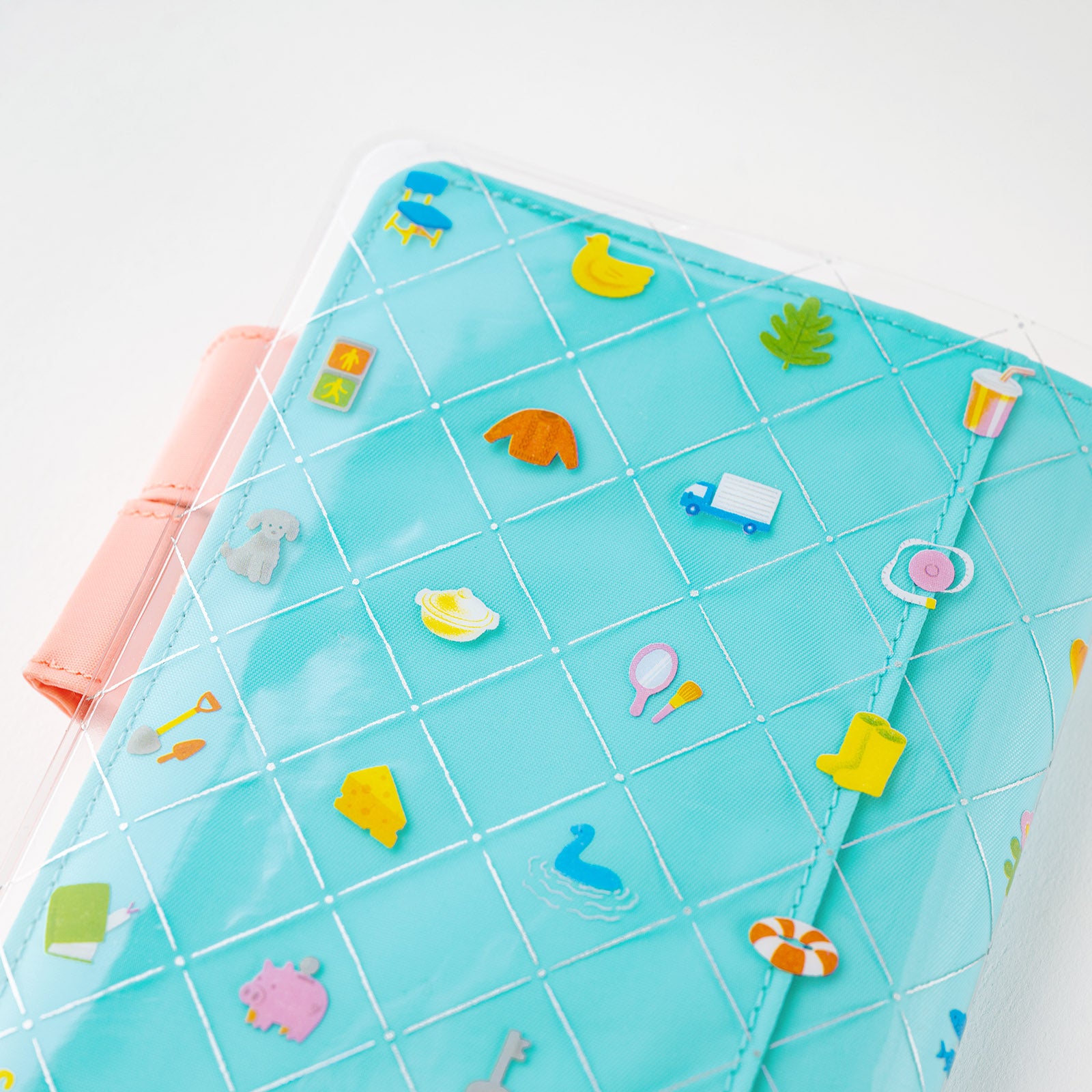 Hobonichi Kanako Kagaya: Cover on Cover for A6 Size (Familiar Sights)  Cover on cover is a protective cover that can be used on top of your Hobonichi cloth covers to protect them from wear and tear. This product can not be used on top of the book only. You can also store illustrations under your cover on cover to boost your Hobonichi covers design.   The design for “Familiar Sights” was created by designer and illustrator Kanako Kagaya.