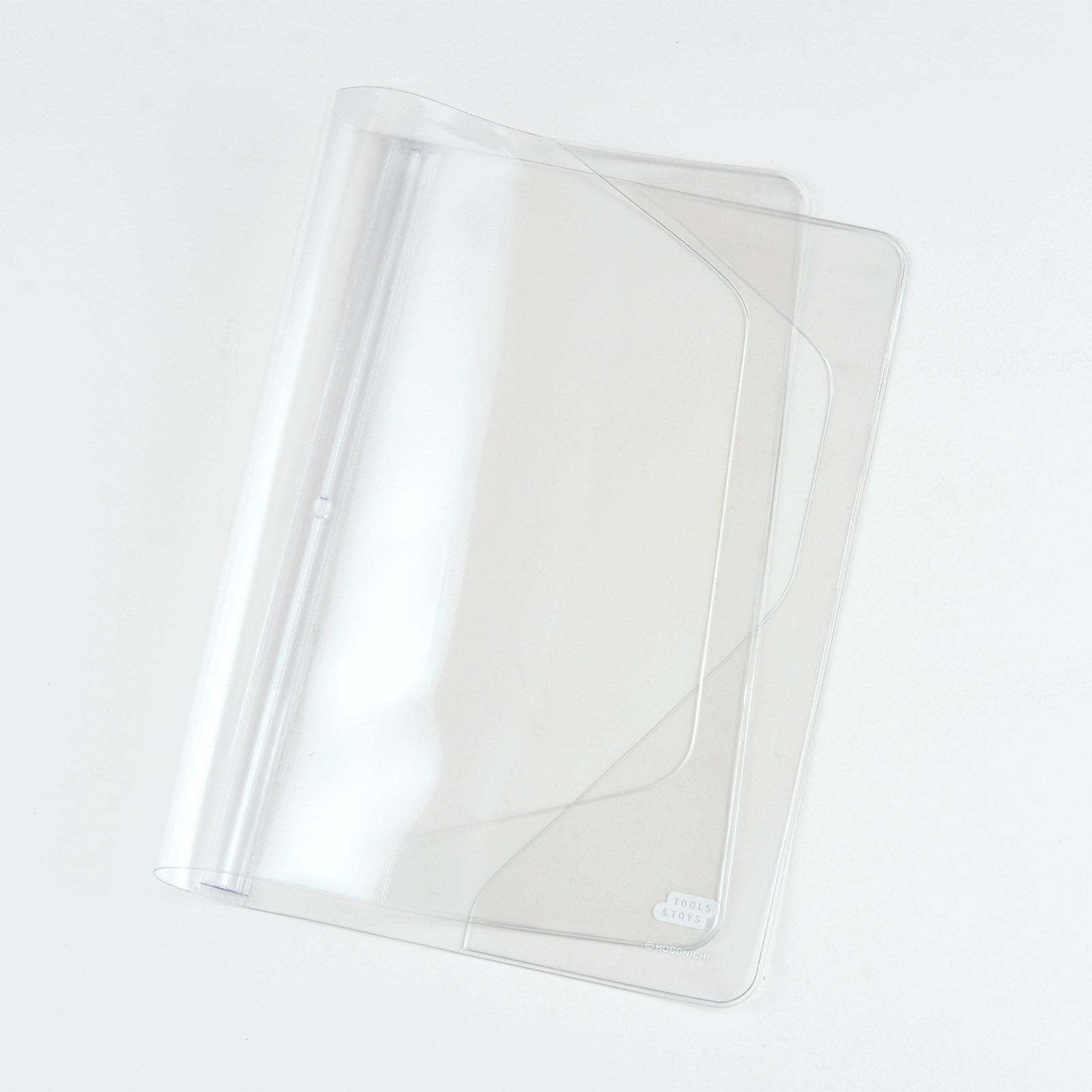 Hobonichi Clear Cover on Cover / A5 Cousin Cover on cover is a protective cover that can be used on top of your Hobonichi Cousin cloth covers to protect them from wear and tear. This product can not be used on top of the book only. You can also store illustrations under your cover on cover to boost your Hobonichi covers design.