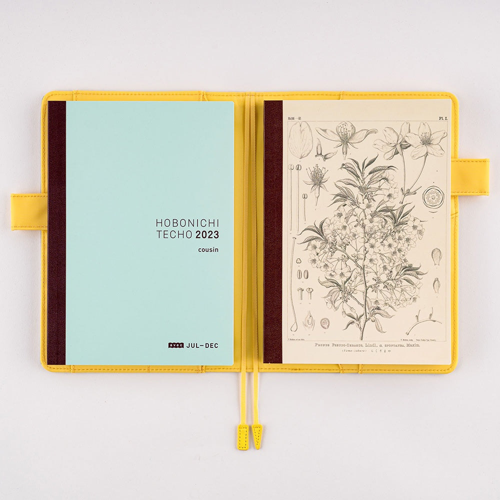 Hobonichi Plain Notebook A5 Tomitaro Makino : Yamazakura  Notebook features an illustration of a Yamazakura cherry tree created by the botanist Tomitaro Makino in 1900. Makino is known for his detailed works of art.  This notebook has Tomoe River paper, opens completely flat, and contains graph paper divided into 4 colors.